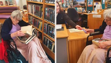 Resident from Douglas View care home takes a trip to local library
